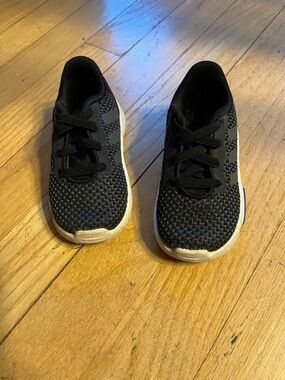 black adidas sneakers toddler size 5 with white soles .. excellent condition